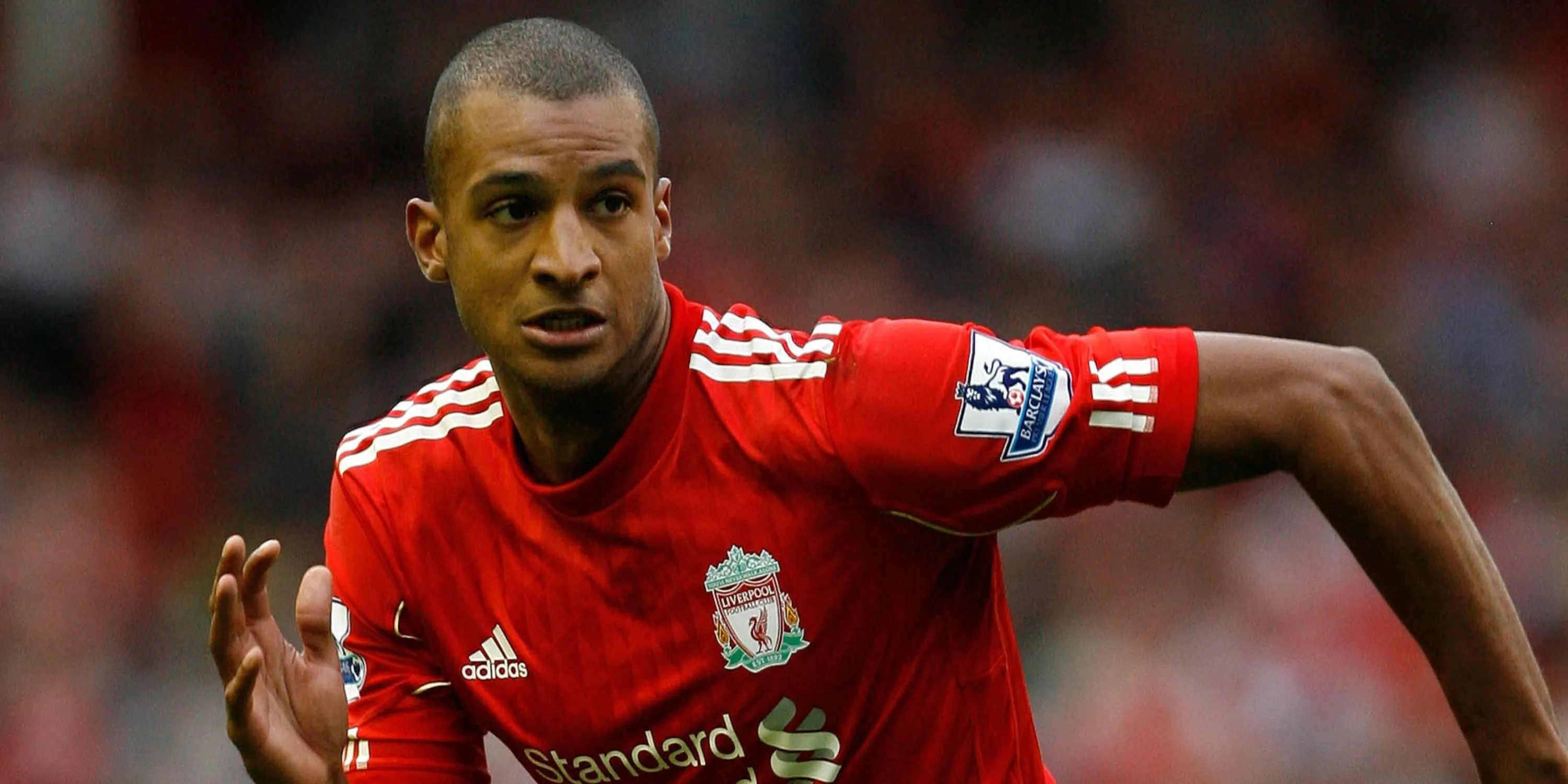 Tiền đạo David Ngog ăn mừng bàn thắng cho Liverpool.